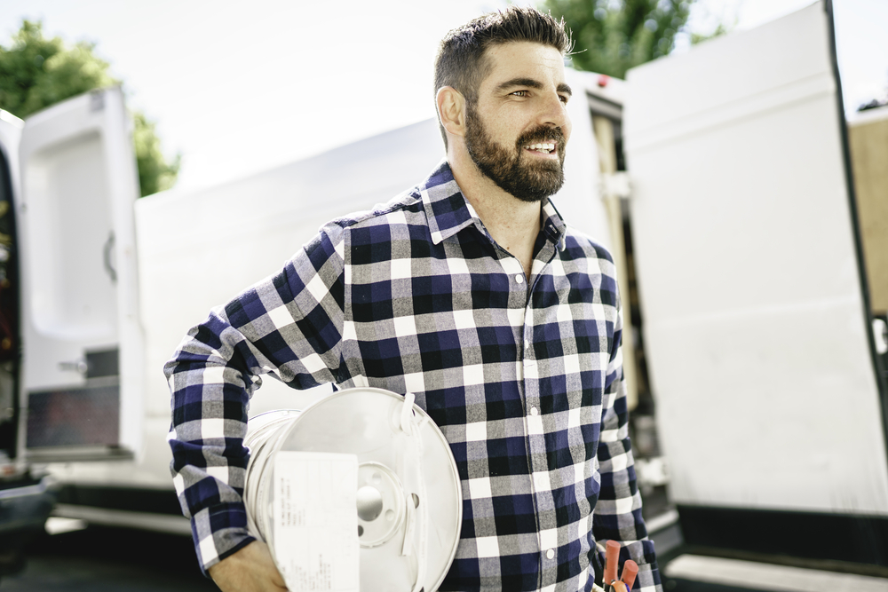 A Portrait of an electrician happy worker at work